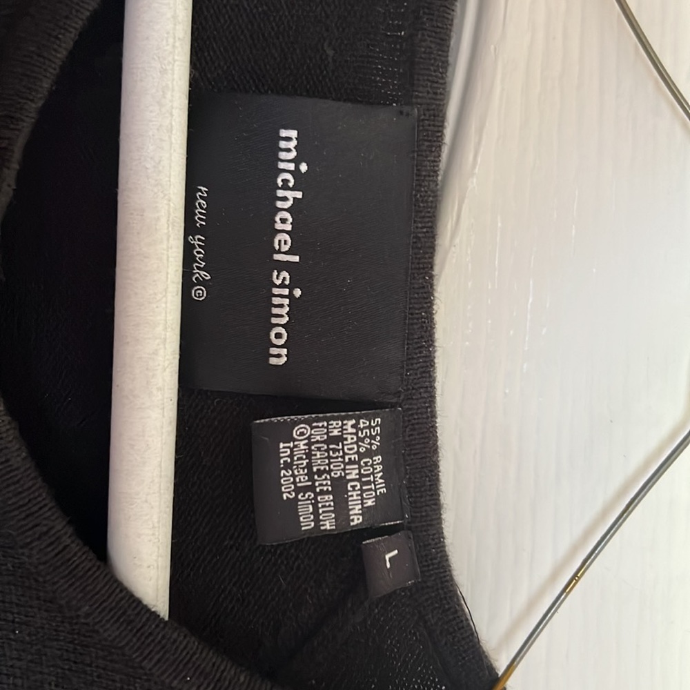 Black sweater, fabric buttons, design “shoe shopping girl”
